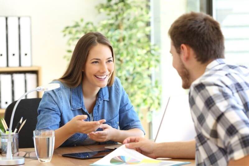 two adults talking